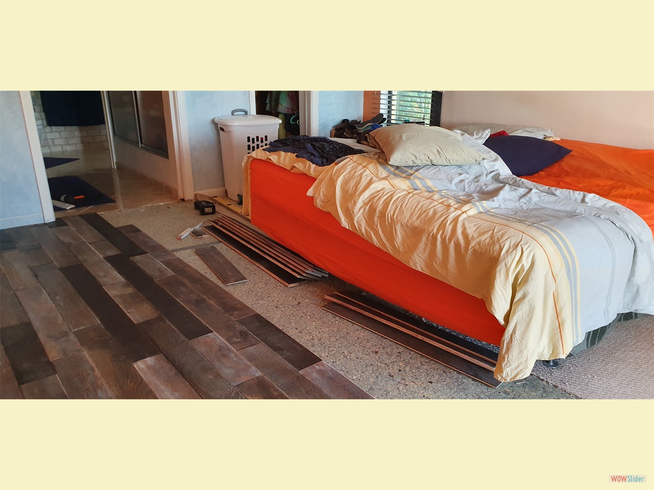 ... and Juergen started laying the new laminate around the old bed.