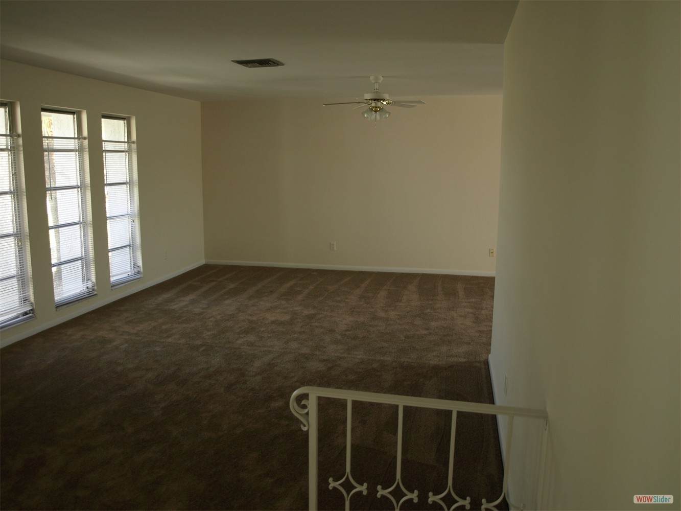 The empty front room as seen from the hall ...